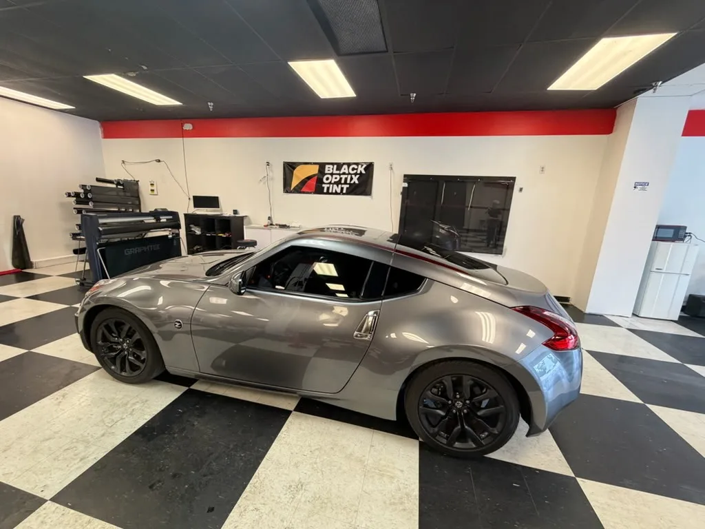 Grey Nissan 370Z coupe tinted at the Pensacola shop